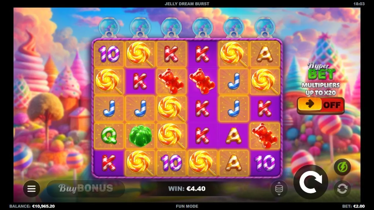 Een vollere cascade met een cluster gele lolly's en rode snoep-K's; de winst loopt op naar €4,40. Precies het soort tussenwinst dat het basisspel draaiend houdt.